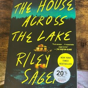 The house across the lake by Riley green